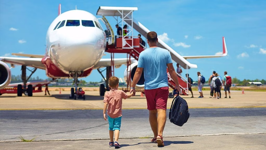Travelers boarding their flight