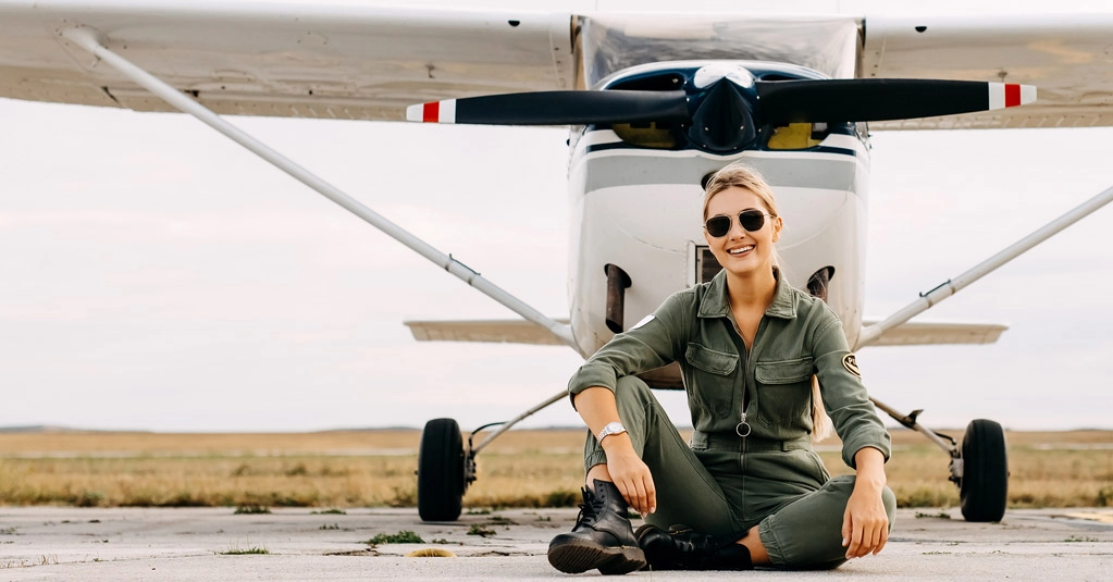 female pilot in front of the aircraft