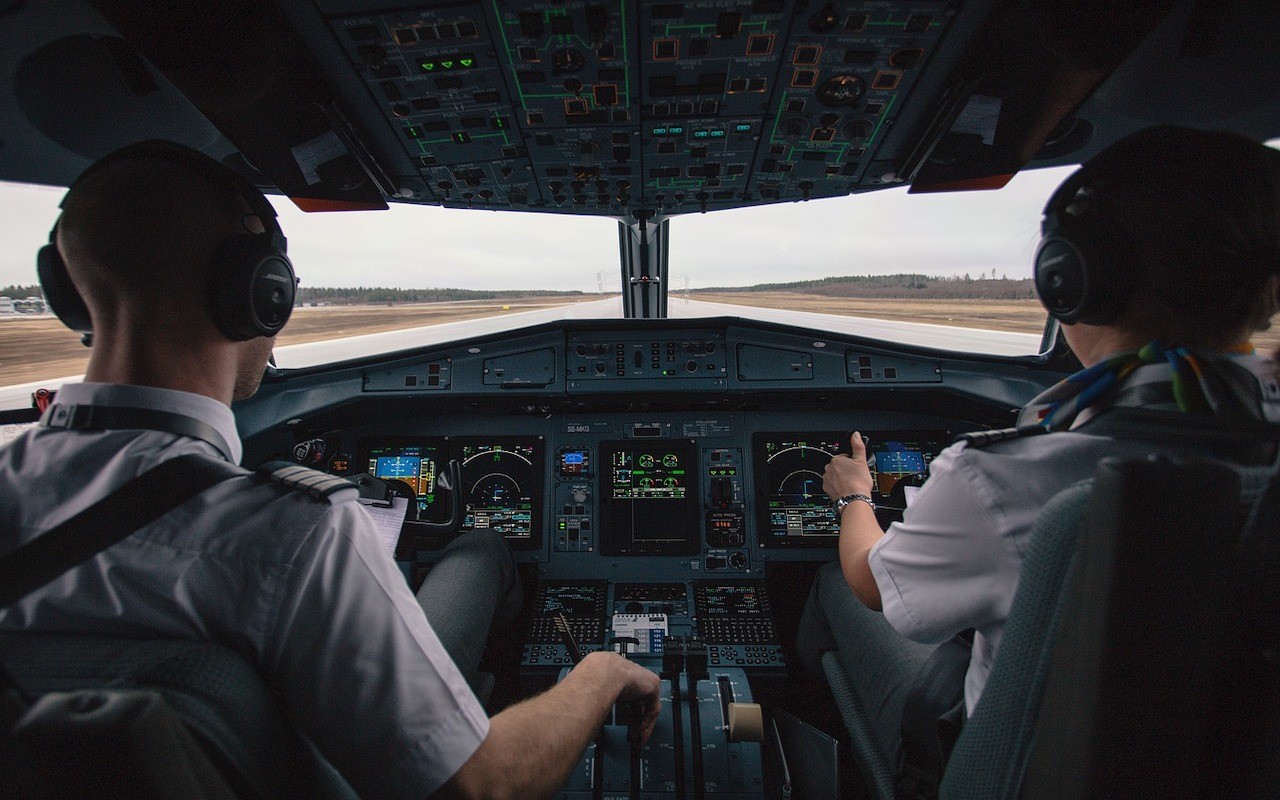 pilots in the flight deck