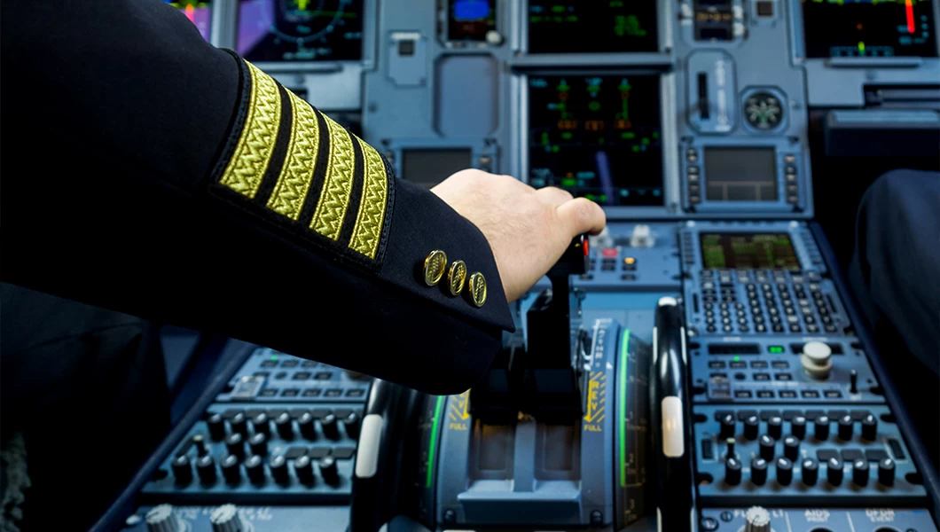 An airline Captain piloting the airplane.