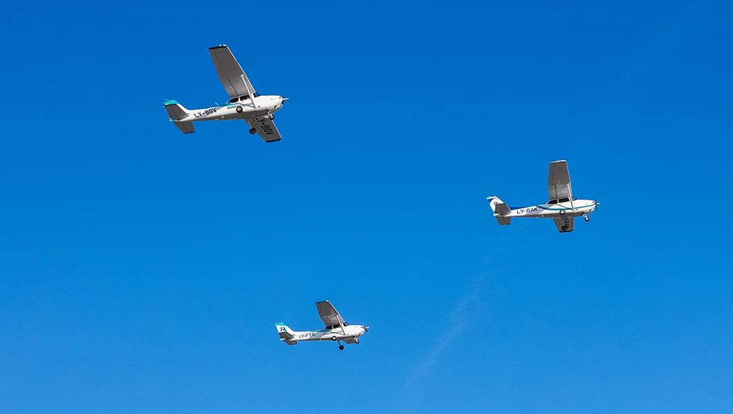 Three BAA Training's Cessna 172 Skyhawk aircraft flying in formation