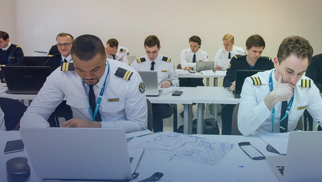 A classroom with cadets learning.